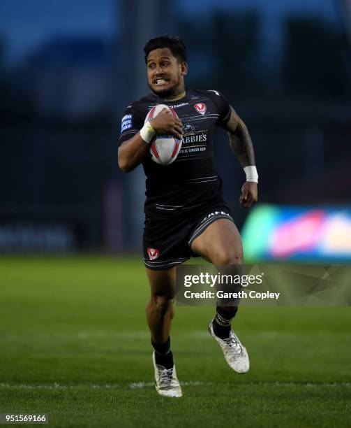 Ben Barba of St Helens runs the length of the field to score his second try during the Betfred Super League match between Salford Red Devils and St...