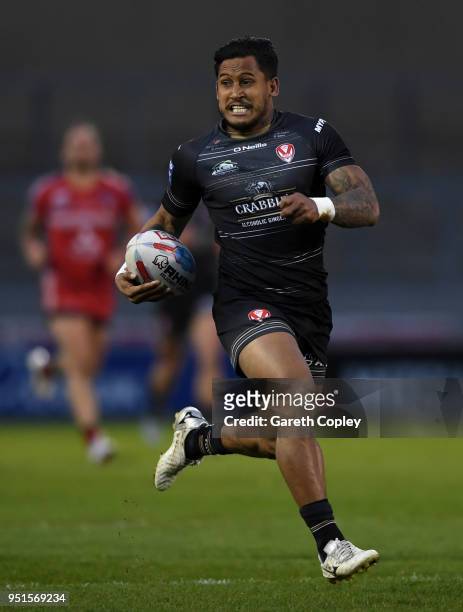 Ben Barba of St Helens runs the length of the field to score his second try during the Betfred Super League match between Salford Red Devils and St...