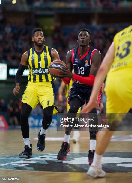 Ilimane Diop, #12 of Kirolbet Baskonia Vitoria Gasteiz competes with Jason Thompson, #1 of Fenerbahce Dogus Istanbul during the Turkish Airlines...