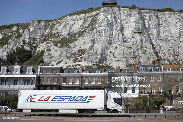 Lorry drives under the White Cliffs as it arrives at Dover Ferry Terminal on April 26, 2018 in Dover, England. After speeking to a parliamentary...
