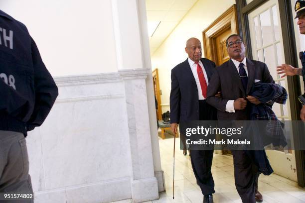Bill Cosby departs the Montgomery County Courthouse with his publicist, Andrew Wyatt, after being found guilty on all counts in his sexual assault...