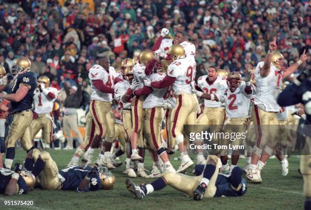 Boston College players victorious on field after winning field goal vs Notre Dame at Notre Dame Stadium. South Bend, IN CREDIT: Tom Lynn