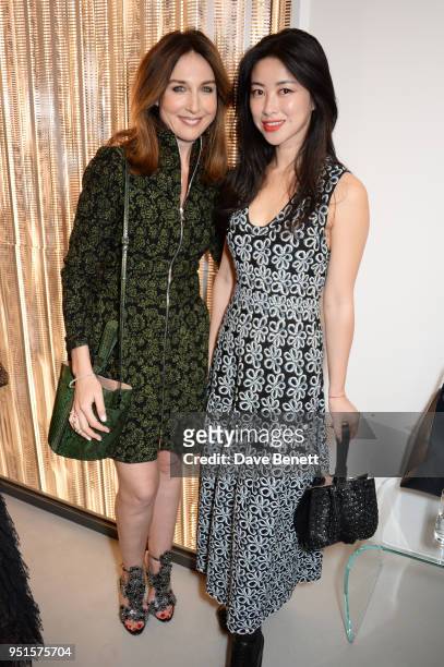 Elsa Zylberstein and Zhu Zhu attend the opening of Maison Alaia on New Bond Street on April 26, 2018 in London, England.