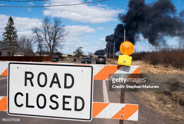 Road is closed as smoke pours from a fire at the Husky Oil Refinery on April 26, 2018 in Superior, Wisconsin. Schools and a small hospital near the...