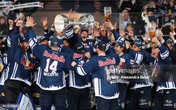 Players of EHC Red Bull Muenchen celebrate their German Championship title after the DEL Play-offs Final Match 7 between EHC Red Bull Muenchen and...