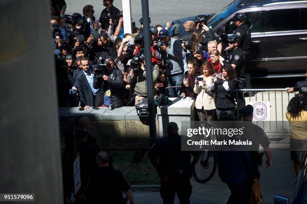 Members of the media question Bill Cosby and his publicist, Andrew Wyatt, as he departs the Montgomery County Courthouse, after being found guilty on...