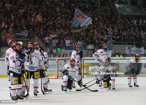 Players of Eisbaeren Berlin react after loosing the DEL Play-offs Final Match 7 between EHC Red Bull Muenchen and Eisbaeren Berlin and the German...