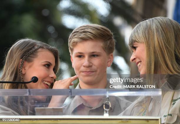 Conservationists and TV personalities Bindi Irwin, Robert Irwin and Terri Irwin look on at the ceremony for the star of Steve Irwin, who was honored...