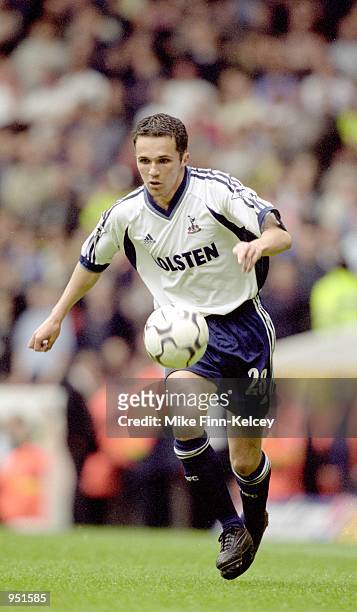 Matthew Etherington of Tottenham Hotspur runs with the ball during the FA Carling Premiership match against Manchester United played at White Hart...