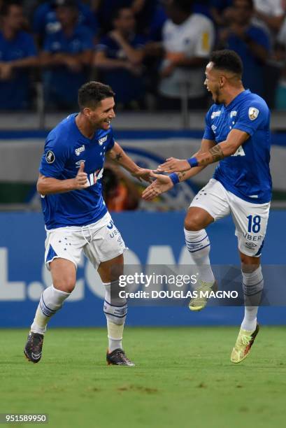 Thiago Neves of Brazil's Cruzeiro celebrates his goal against Chile's Universidad de Chile with Rafinha , during their 2018 Copa Libertadores match...