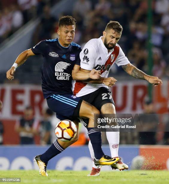 Lucas Pratto of River Plate fights for the ball with Marlon Mauricio Mejia of Emelec during a match between River Plate and Emelec as part of Copa...