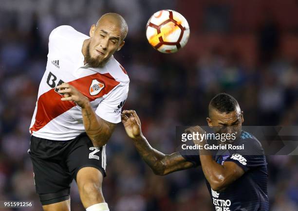 Jonatan Maidana of River Plate fights for the ball with Dixon Jair Arroyo Espinoza of Emelec during a match between River Plate and Emelec as part of...
