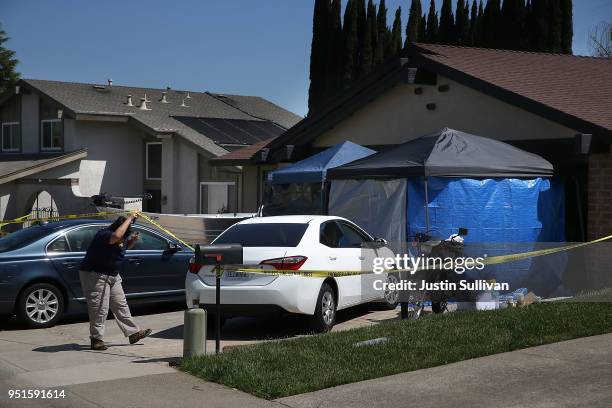 An FBI investigator enters the home of accused rapist and killer Joseph James DeAngelo on April 24, 2018 in Citrus Heights, California. Sacramento...