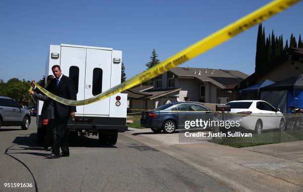 Law enforcement officials leave the home of accused rapist and killer Joseph James DeAngelo on April 24, 2018 in Citrus Heights, California....