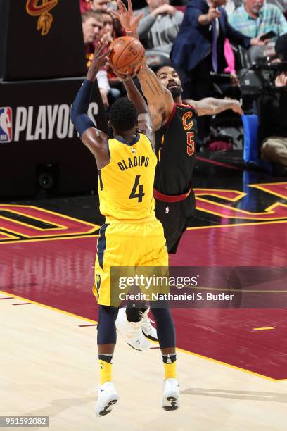 Victor Oladipo of the Indiana Pacers shoots the ball over JR Smith of the Cleveland Cavaliers in Game Five of Round One of the 2018 NBA Playoffs on...