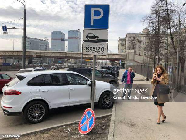 Cars are seen at the municipal paid parking in Moscow, Russia, April 2018. The U.S. Slapped sanctions on several Russian oligarchs, business and...