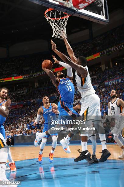 Paul George of the Oklahoma City Thunder goes to the basket against the Utah Jazz in Game Five of Round One of the 2018 NBA Playoffs on April 25,...