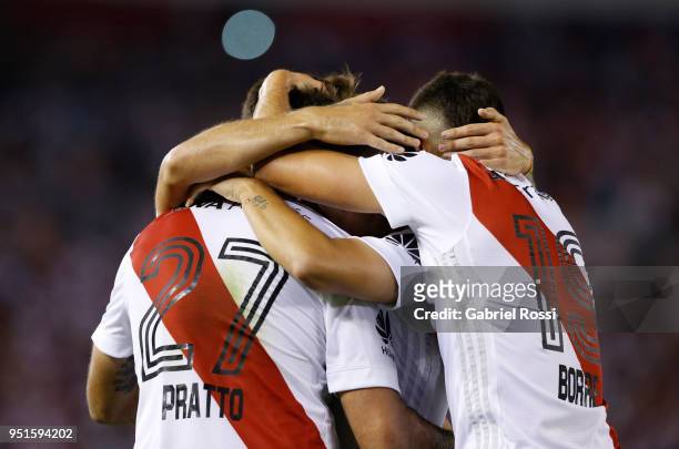 Lucas Pratto of River Plate celebrates with teammates after scoring the first goal of his team during a match between River Plate and Emelec as part...