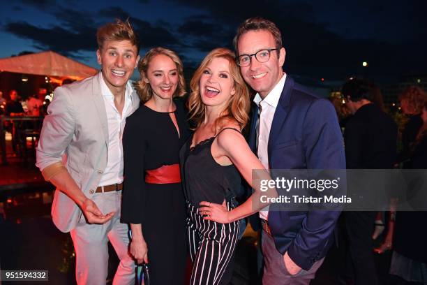 Lukas Sauer, Anne-Catrin Maerzke, Peter Imhof and his wife Eva Imhof attend the BUNTE New Faces Award Film at Spindler & Klatt on April 26, 2018 in...