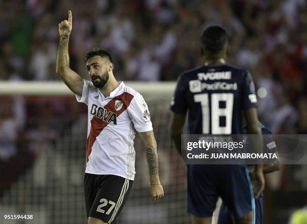 Argentina's River Plate forward Lucas Pratto celebrates after scoring a goal against Ecuador's Emelec during the Copa Libertadores 2018 group D...