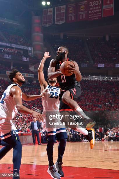 James Harden of the Houston Rockets goes to the basket against the Minnesota Timberwolves in Game Five of the Western Conference Quarterfinals during...