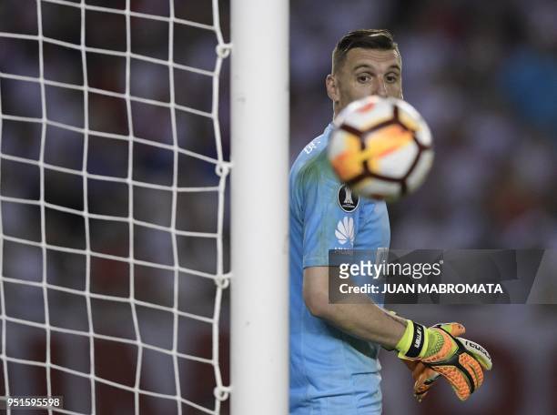Argentina's River Plate goalkeeper Franco Armani gestures during the Copa Libertadores 2018 group D football match against Ecuador's Emelec at the...