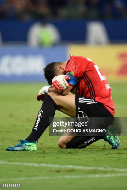 The goalkeeper of Chile's Universidad de Chile, Johnny Herrera, reacts after receiving a goal during the Copa Libertadores football match against...