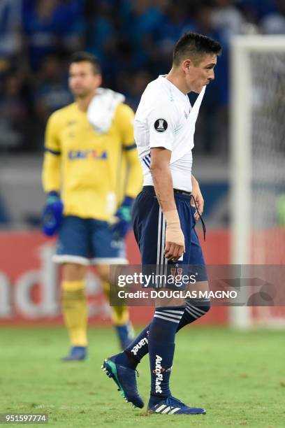 Matias Rodriguez of Chile's Universidad de Chile leaves the field are losing 7-0 to Brazilian team Cruzeiro in a Copa Libertadores football match at...