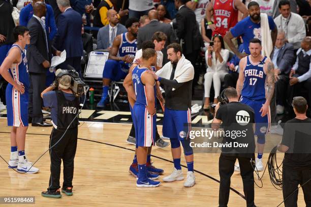 Marco Belinelli of the Philadelphia 76ers speaks to Justin Anderson of the Philadelphia 76ers after the game against the Miami Heat in Game Three of...