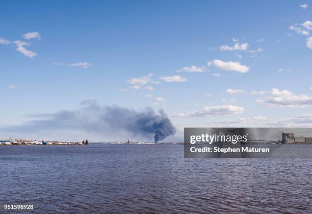 View of the fire at the Husky Oil Refinery on April 26, 2018 in Superior, Wisconsin. An explosion at the refinery caused injuries to several workers...