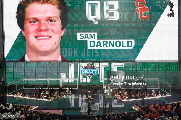 Sam Darnold of USC poses with NFL Commissioner Roger Goodell after being picked overall by the New York Jets during the first round of the 2018 NFL...