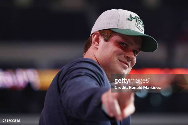 Sam Darnold of USC gestures after being picked overall by the New York Jets during the first round of the 2018 NFL Draft at AT&T Stadium on April 26,...