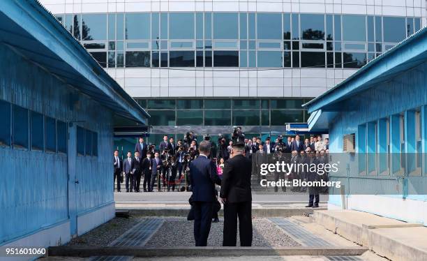 South Korean President Moon Jae-in, left, and North Korean leader Kim Jong Un pose for a photograph as they meet at the truce village of Panmunjom in...