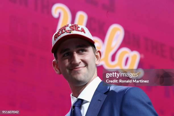 Josh Rosen of UCLA reacts after being picked overall by the Arizona Cardinals during the first round of the 2018 NFL Draft at AT&T Stadium on April...