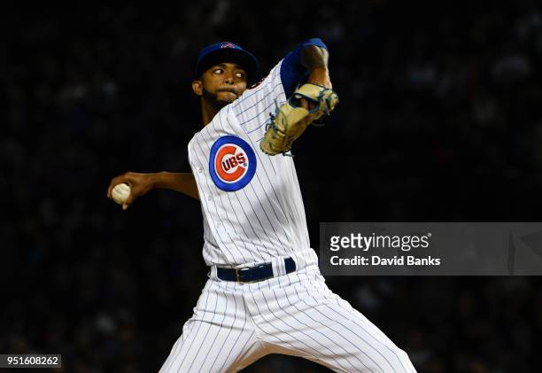 Carl Edwards Jr. #6 of the Chicago Cubs pitches against the Milwaukee Brewers during the eighth inning on April 26, 2018 at Wrigley Field in Chicago,...