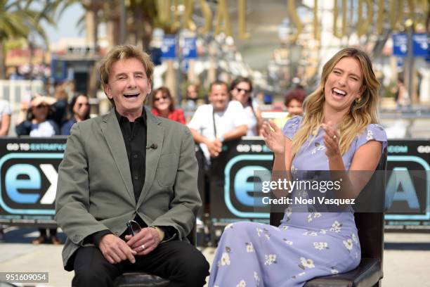 Barry Manilow and Renee Bargh visit "Extra" at Universal Studios Hollywood on April 26, 2018 in Universal City, California.