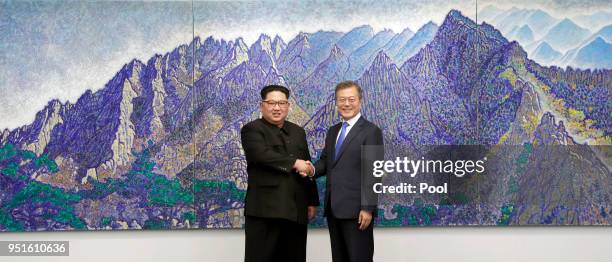 North Korean leader Kim Jong Un and South Korean President Moon Jae-in pose for photos in front of Bukhansan Peace House for the Inter-Korean Summit...