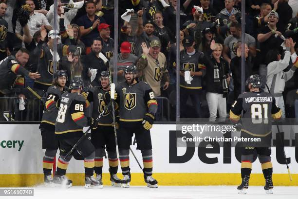 Alex Tuch of the Vegas Golden Knights celebrates with William Karlsson, Nate Schmidt, Reilly Smith and Jonathan Marchessault after scoring a...