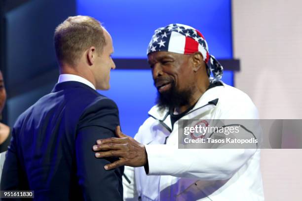 Dan Cnossen accepts the Male Paralympic Athlete of the Games award from Mr. T during the Team USA Awards at the Duke Ellington School of the Arts on...