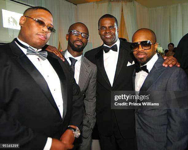 Shawn "Tubby" Holiday, B Cox, Mayor Kasim Reed and Jermain Dupri attend Devyne Stephens' 2009 annual Christmas gala at the Atlanta History Center on...