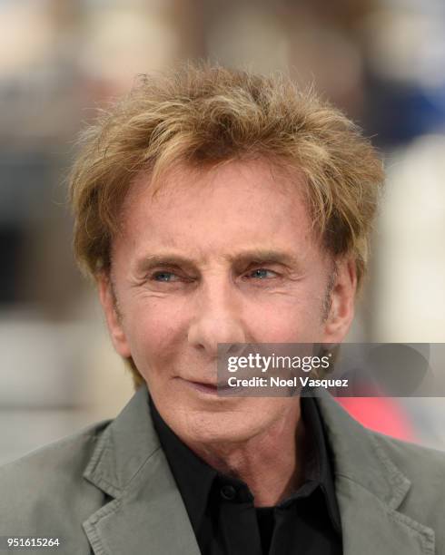 Barry Manilow visits "Extra" at Universal Studios Hollywood on April 26, 2018 in Universal City, California.