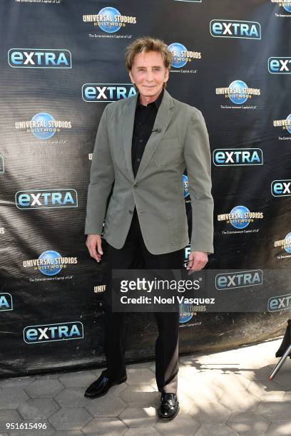 Barry Manilow visits "Extra" at Universal Studios Hollywood on April 26, 2018 in Universal City, California.