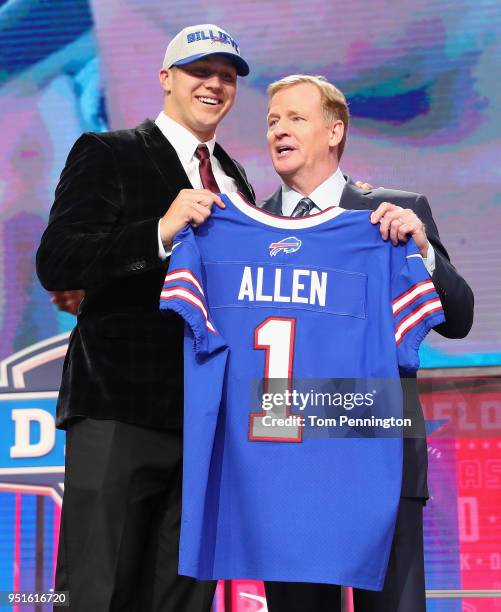 Josh Allen of Wyoming poses with NFL Commissioner Roger Goodell after being picked overall by the Buffalo Bills during the first round of the 2018...