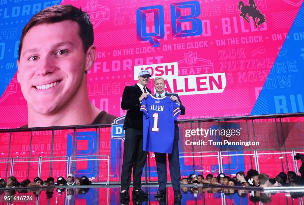 Josh Allen of Wyoming poses with NFL Commissioner Roger Goodell after being picked overall by the Buffalo Bills during the first round of the 2018...