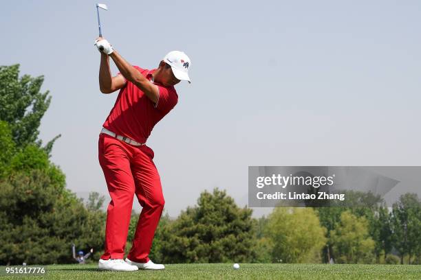 Wu ashun of China plays a shot during the day two of the 2018 Volvo China Open at Topwin Golf and Country Club on April 27, 2018 in Beijing, China.