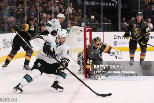 Mikkel Boedker of the San Jose Sharks attempts a wrap-around shot on goaltender Marc-Andre Fleury of the Vegas Golden Knights in the first period...