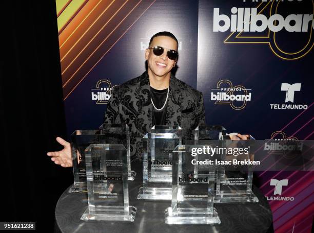 Daddy Yankee poses with his awards backstage at the 2018 Billboard Latin Music Awards at the Mandalay Bay Events Center on April 26, 2018 in Las...