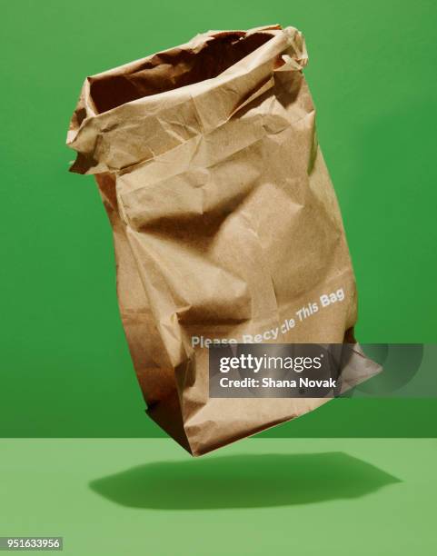 recycleable paper bag - brown paper bag stock pictures, royalty-free photos & images