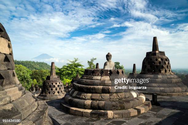 stupas at borobudur temple, central java, indonesia - ボロブドゥール寺院 ストックフォトと画像