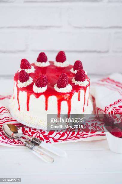 sponge cake with raspberries, cream with raspberry coulis - raspberry coulis stock pictures, royalty-free photos & images